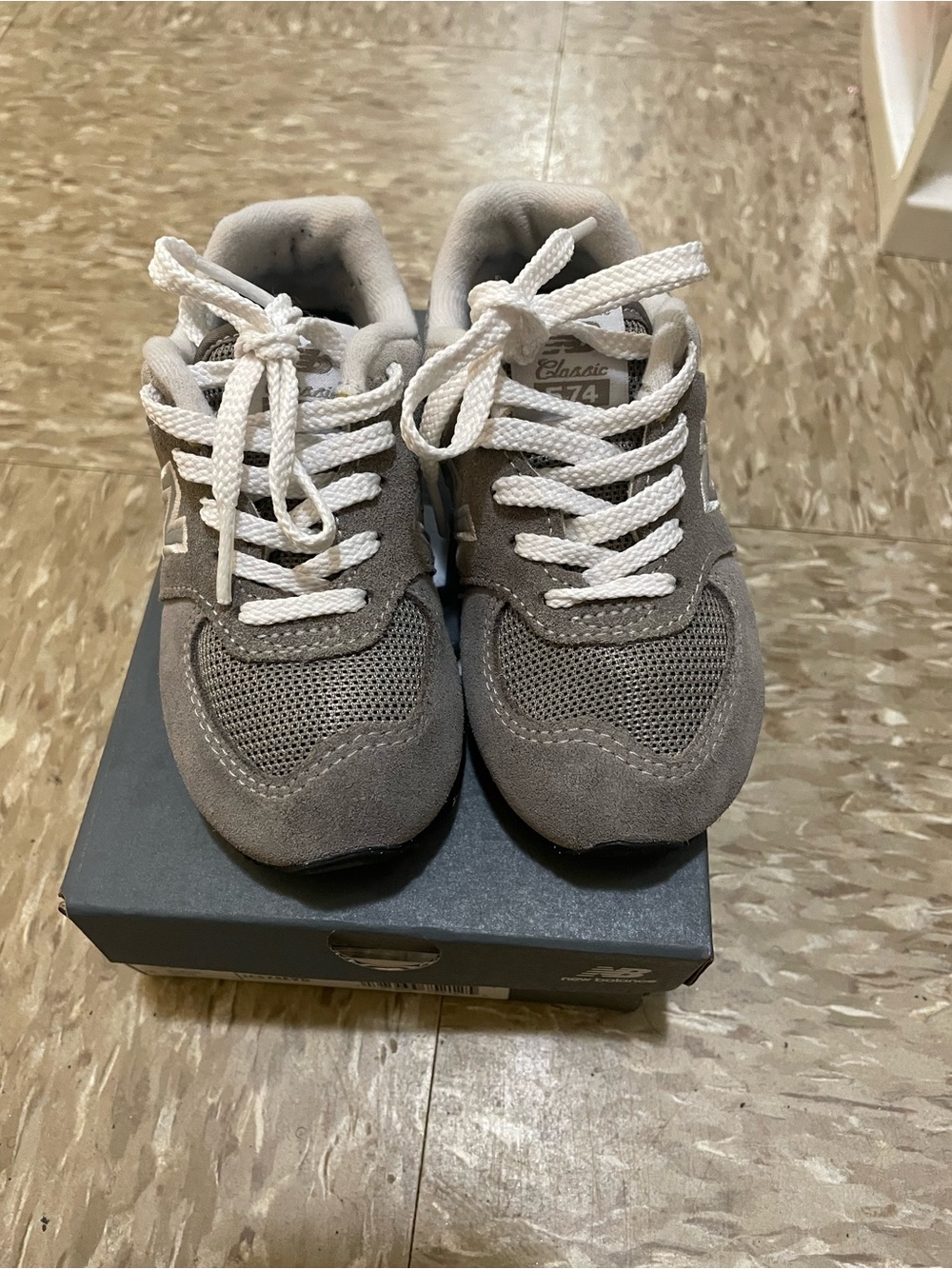 New Balance Kids Gray and White Sneakers